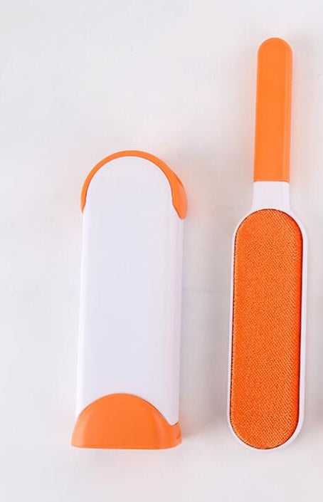 Reusable dog hair remover with self-cleaning base
